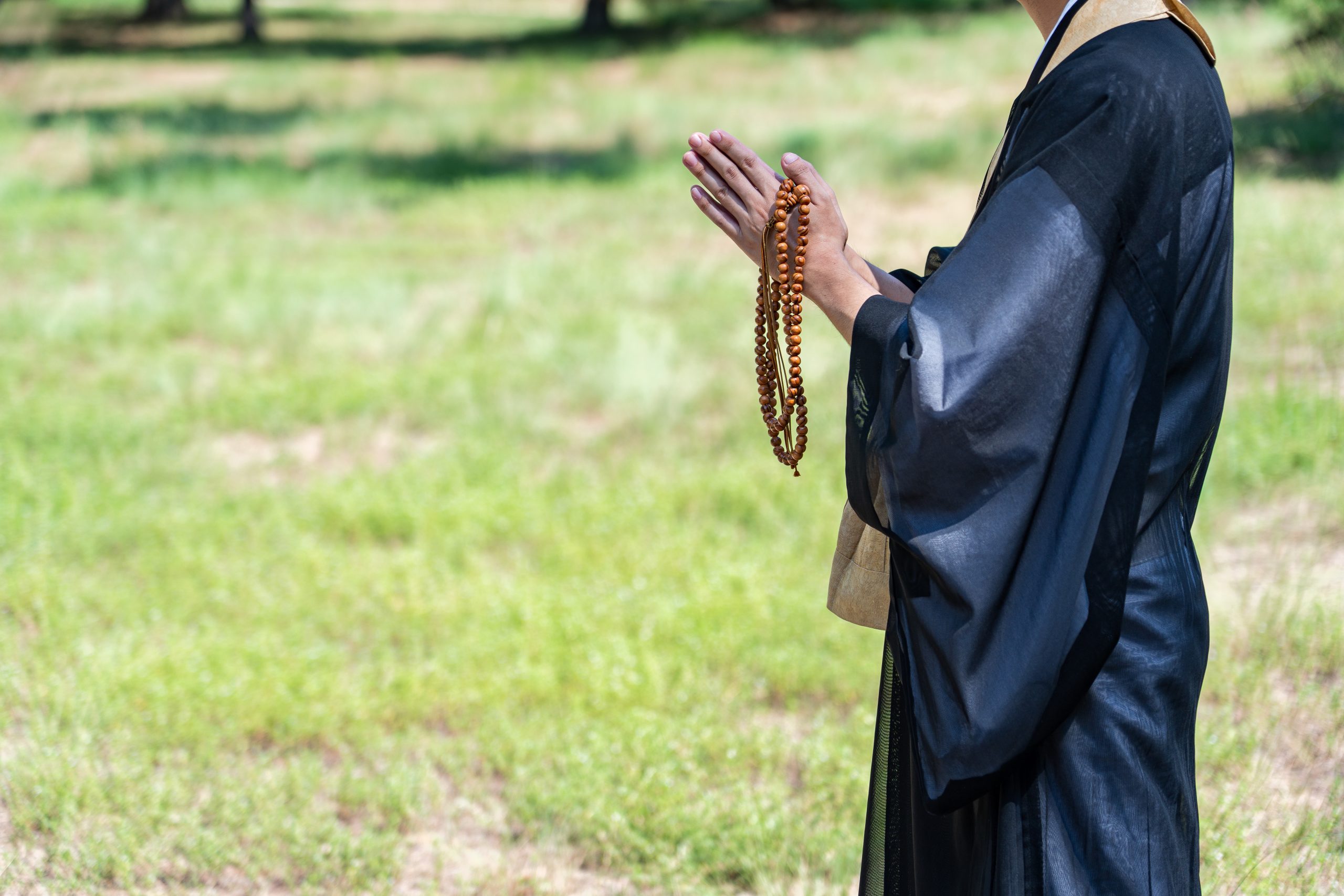 An image of a tree funeral held by a monk