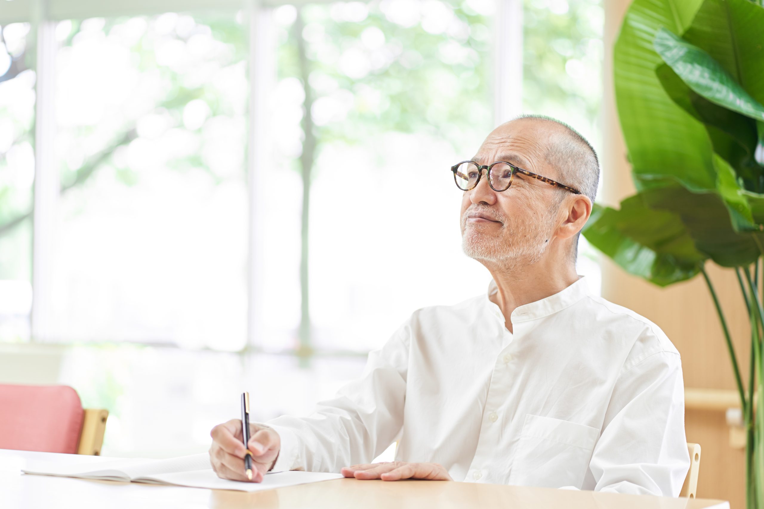 Elderly people writing sentences